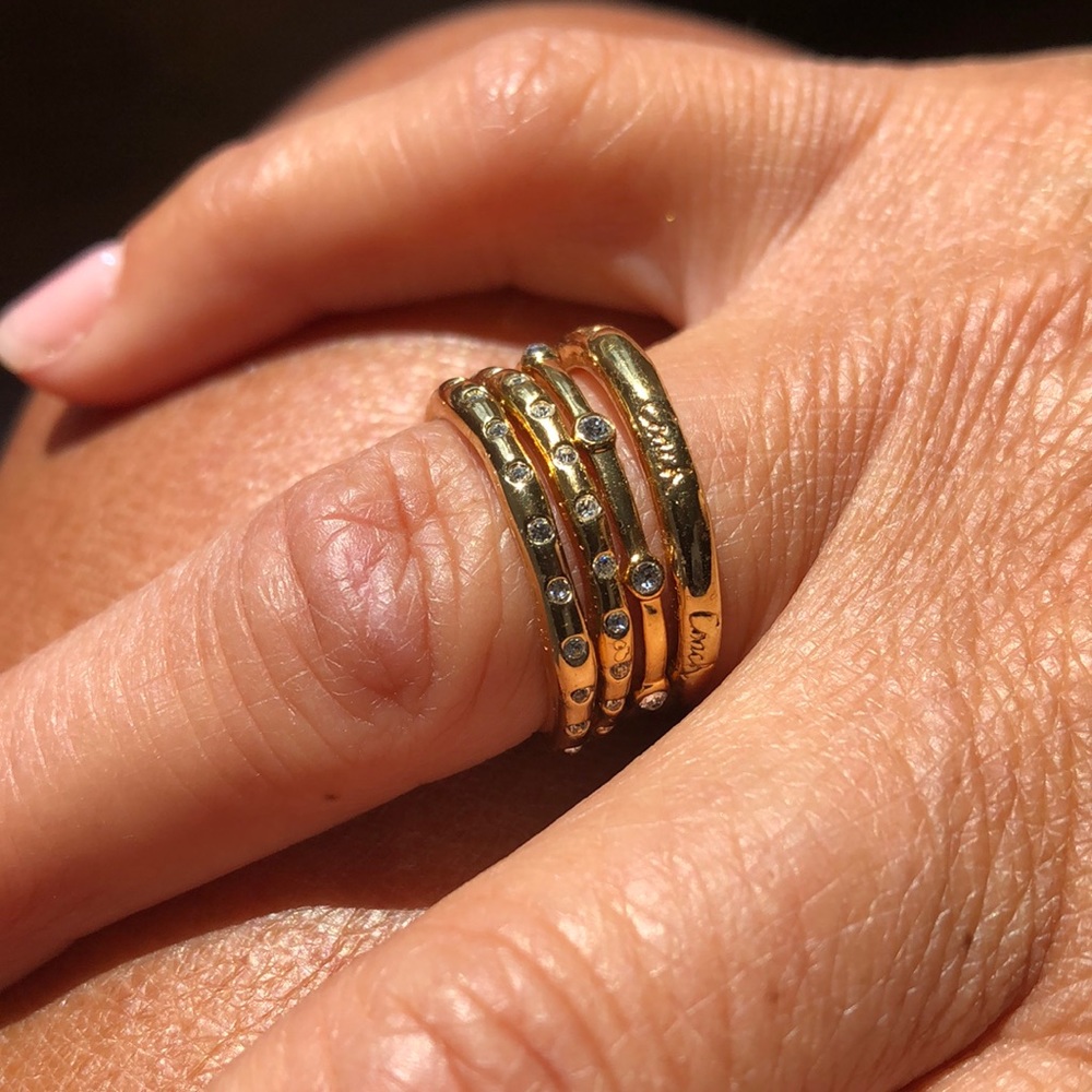 Set of 4 stackable Coach rings pave crystals